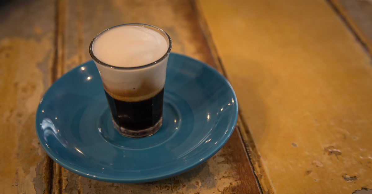 macchiato coffee on the rustic table