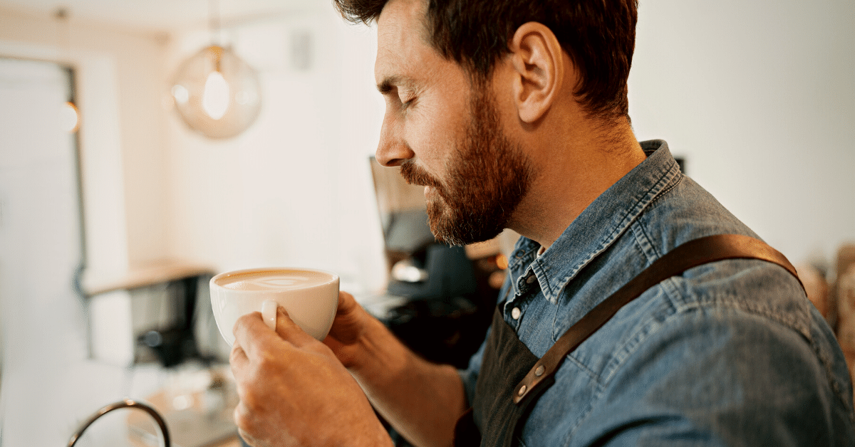 barista smelling coffee