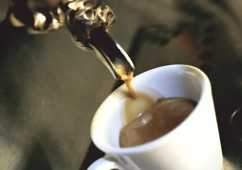 Coffee machine preparing espresso