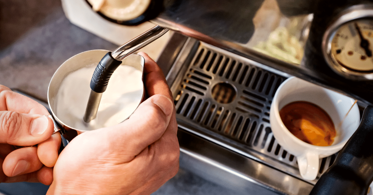 frothing milk on coffee maker