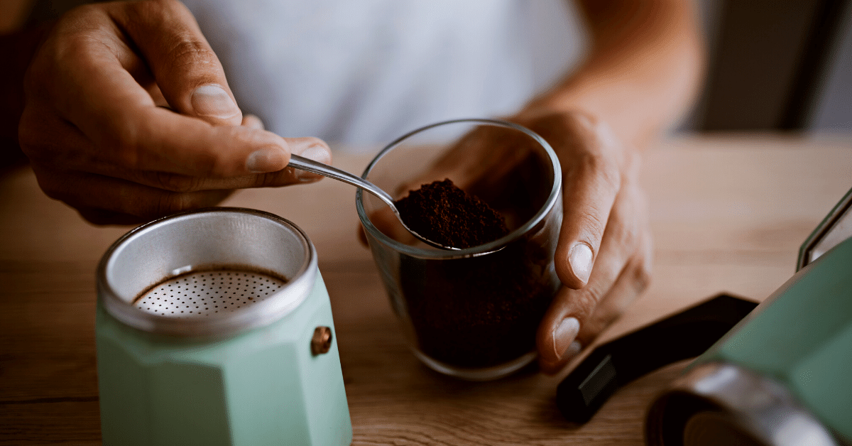 person preparing coffee