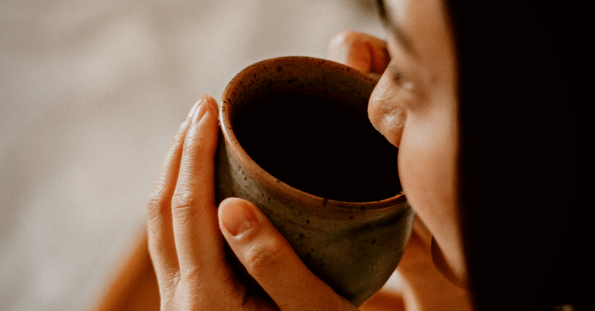 woman drinking coffee