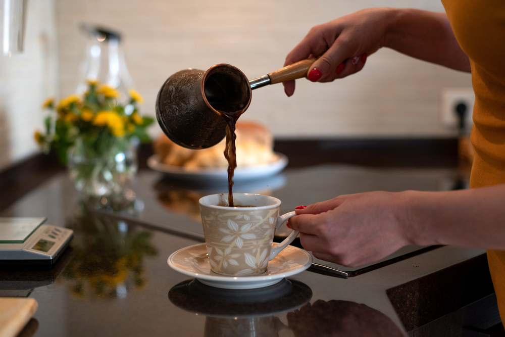 making coffee in a turkish coffee pot