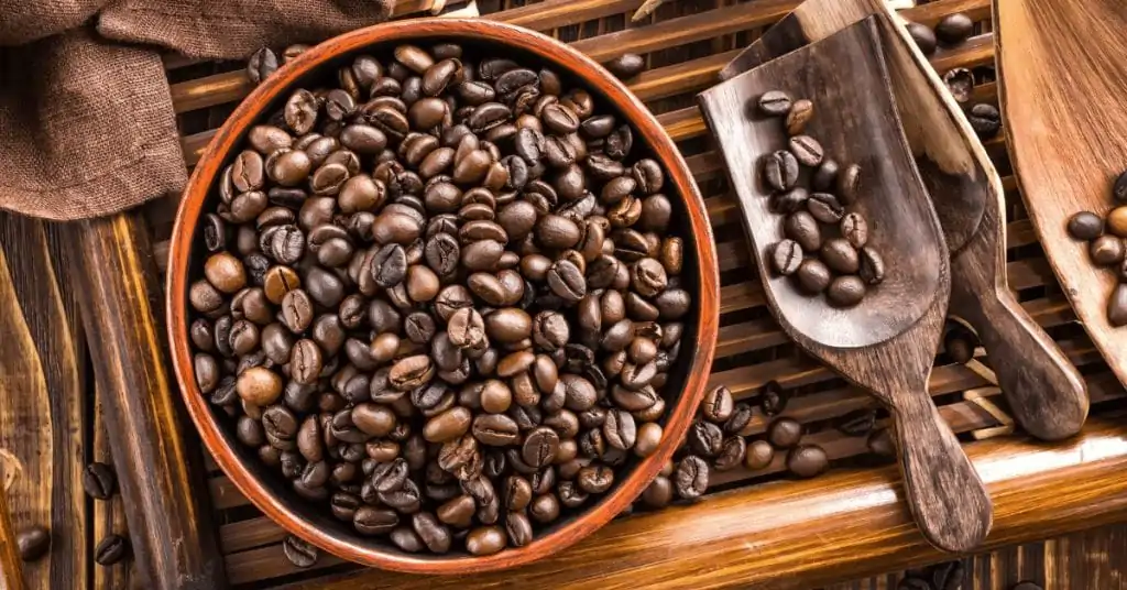 coffee beans in wooden bowl