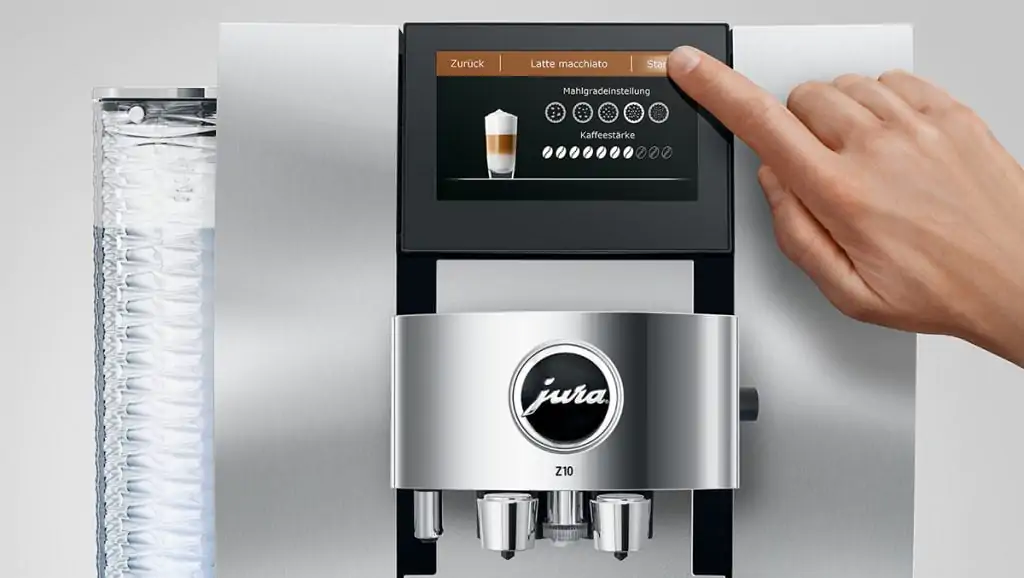 a person customizes the coffee on Jura coffee machine
