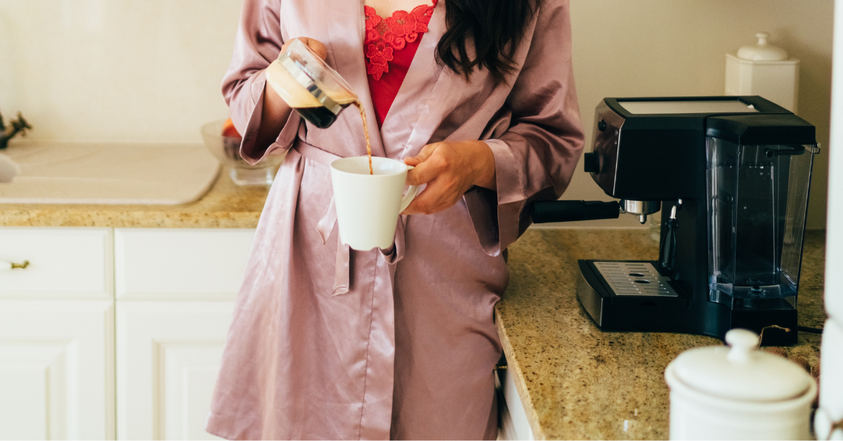 a woman pouring coffee in a cup