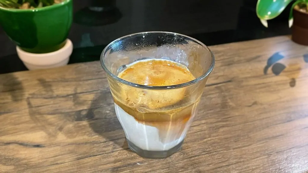 dirty coffee in a glass