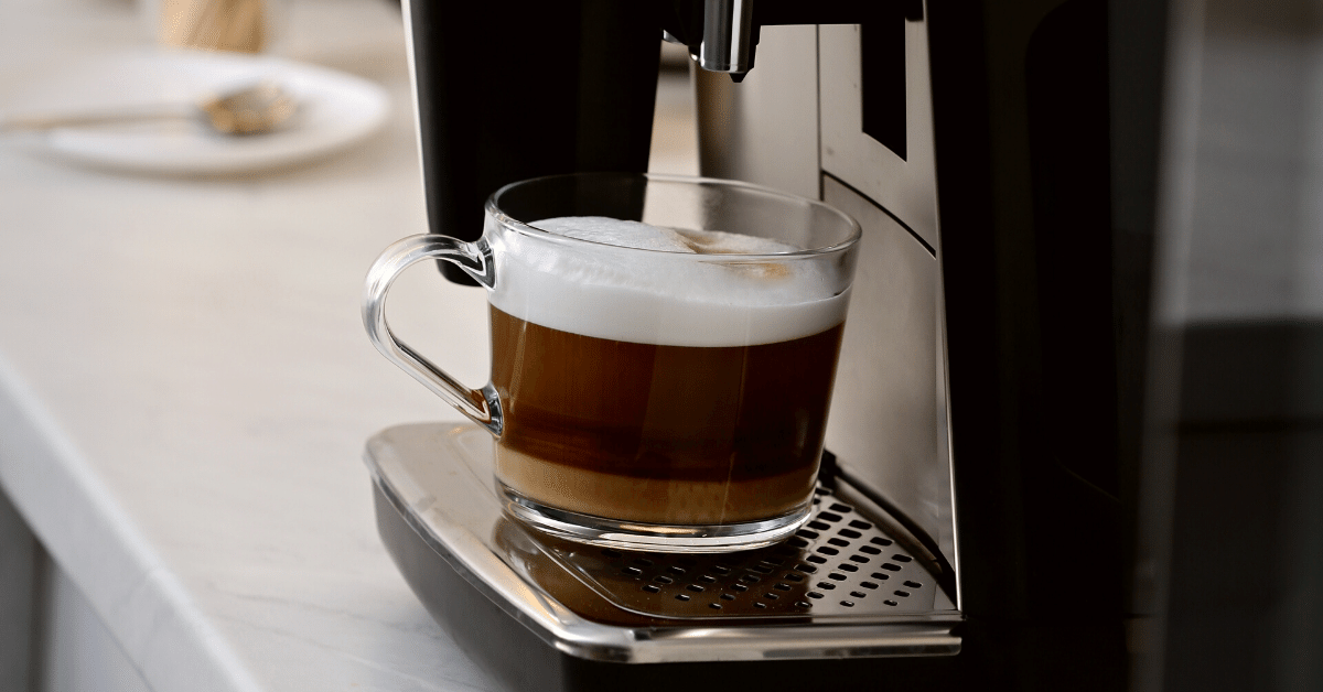 espresso machine and cup of coffee