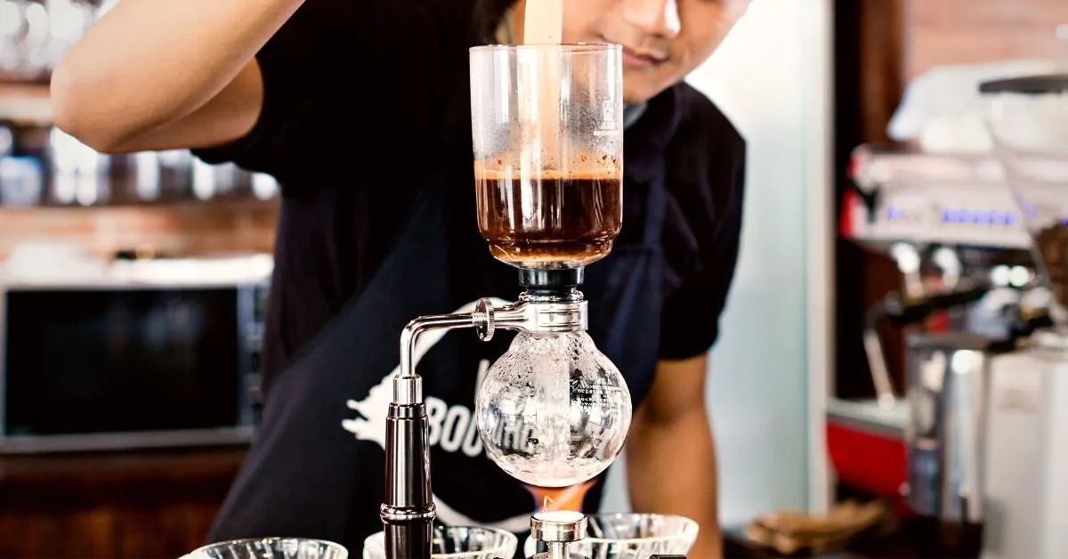 barista preparing drip coffee